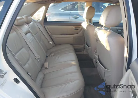 2001 Toyota Avalon Xls z USA, uszkodzony, nr VIN 4T1BF28B61U181068